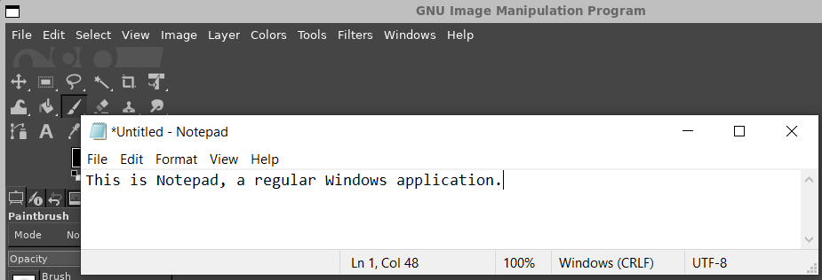 Notepad with GIMP running in background